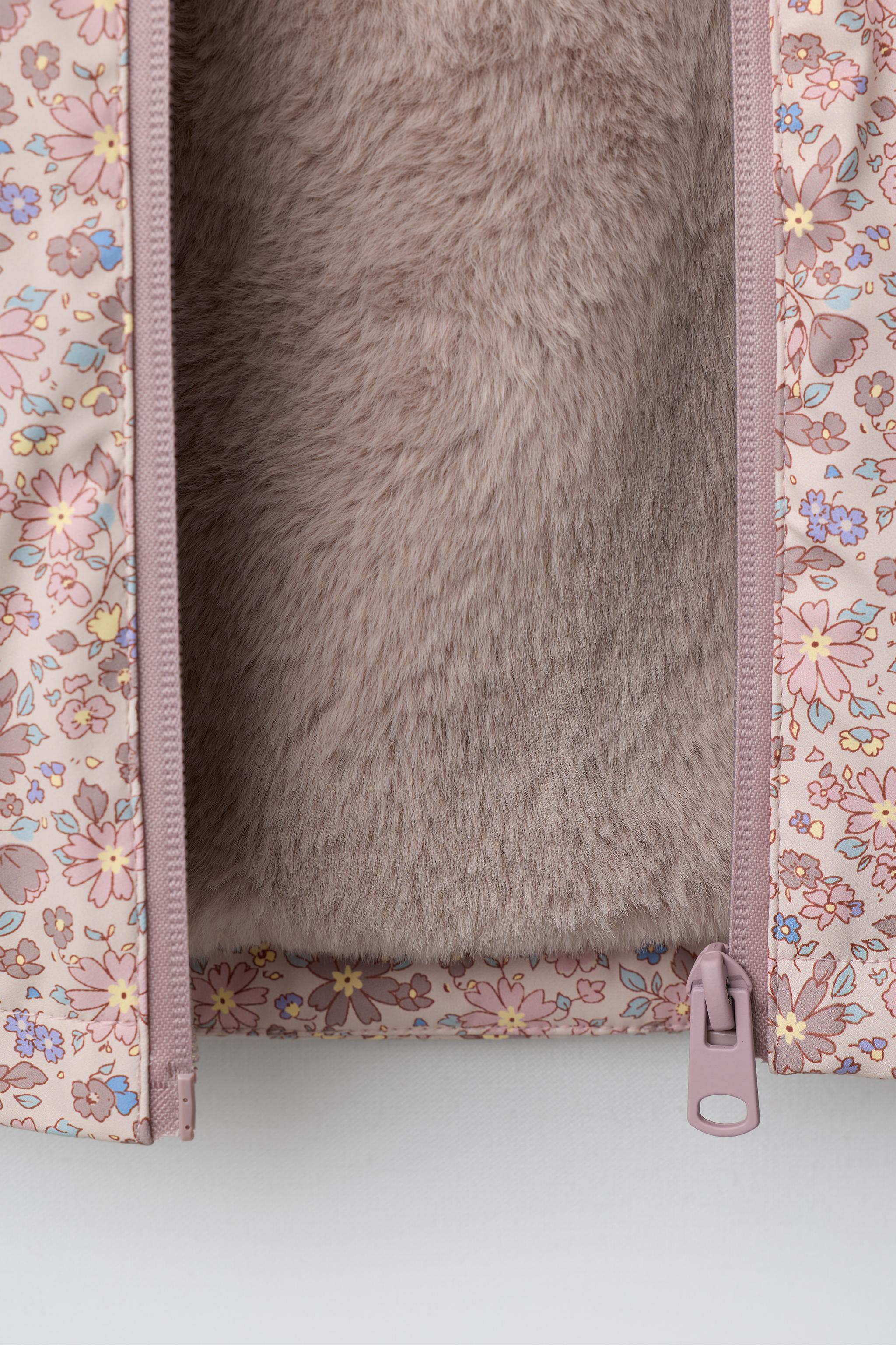 WATER-REPELLENT RUBBERIZED FLORAL RAINCOAT